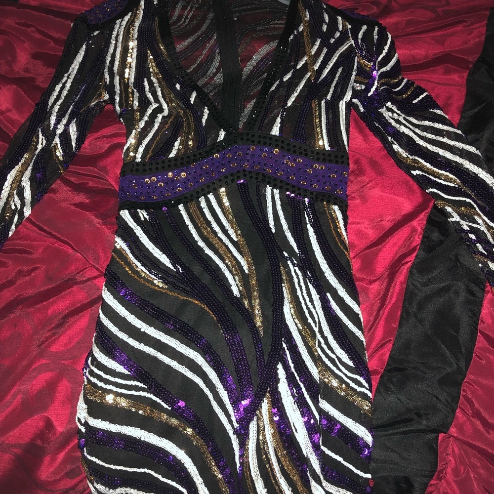 Purple white black and gold dress